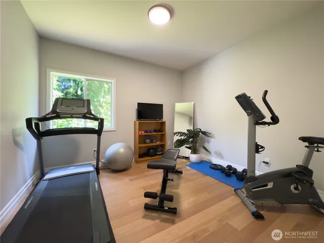 a view of a room with gym equipment
