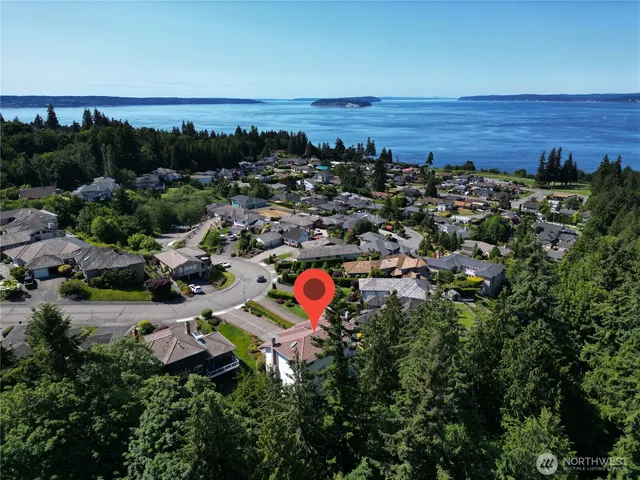 an aerial view of multiple house with outdoor space