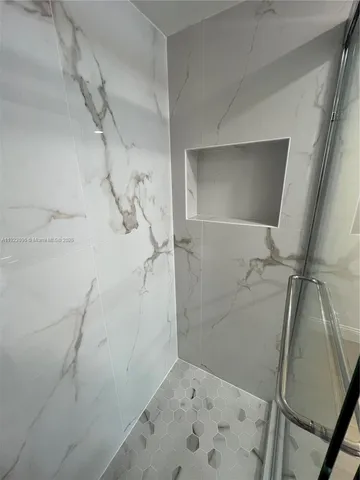 a view of a couch in the kitchen