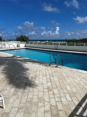 a view of swimming pool with lake view