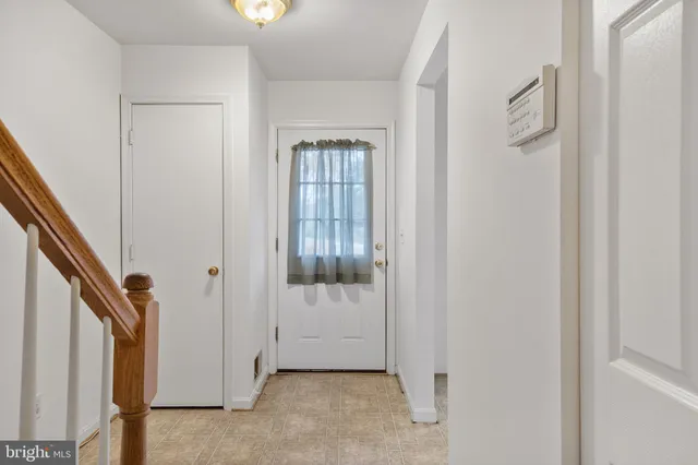 a view of an entryway with hallway