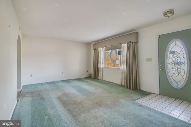 a view of livingroom with hallway