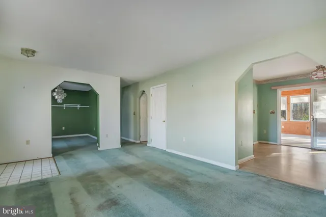 a kitchen with stainless steel appliances granite countertop a stove sink and cabinets