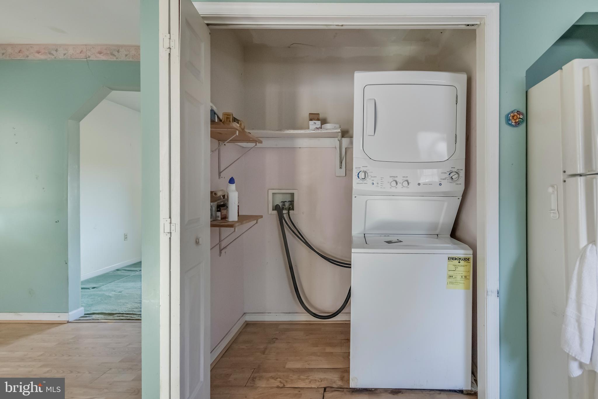 1104 Saffron Way Owings, MD 20736 - Photo 10 of 26 a utility room with dryer and washer