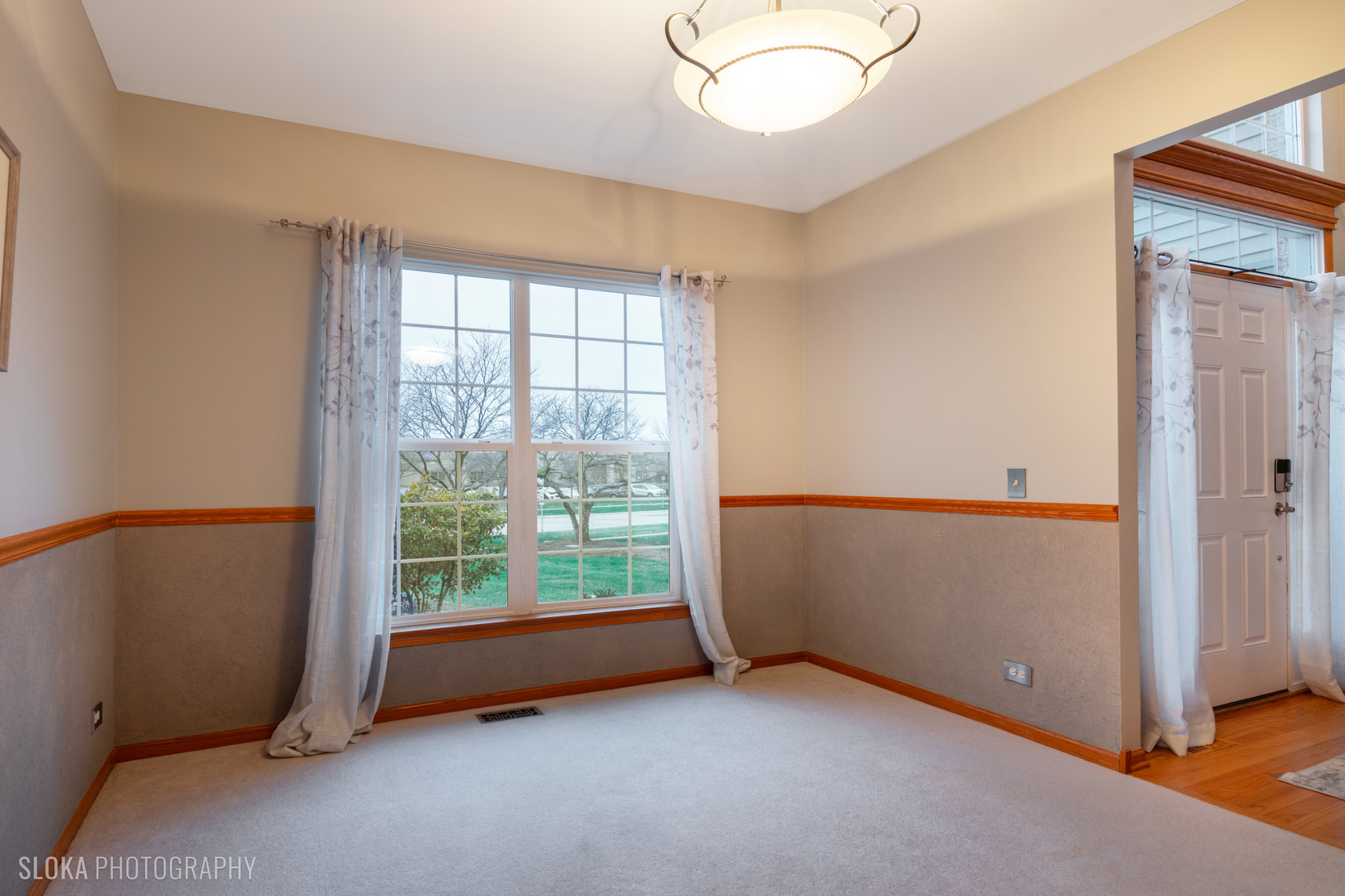 1123 Village Road Crystal Lake, IL 60014 - Photo 11 of 46 an empty room with windows