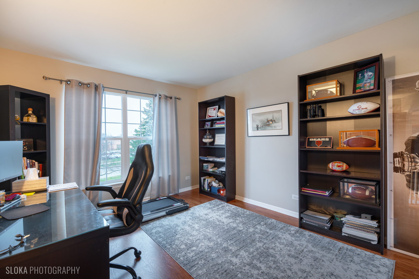 1123 Village Road Crystal Lake, IL 60014 - Photo 19 of 46 a view of a workspace with furniture and a window