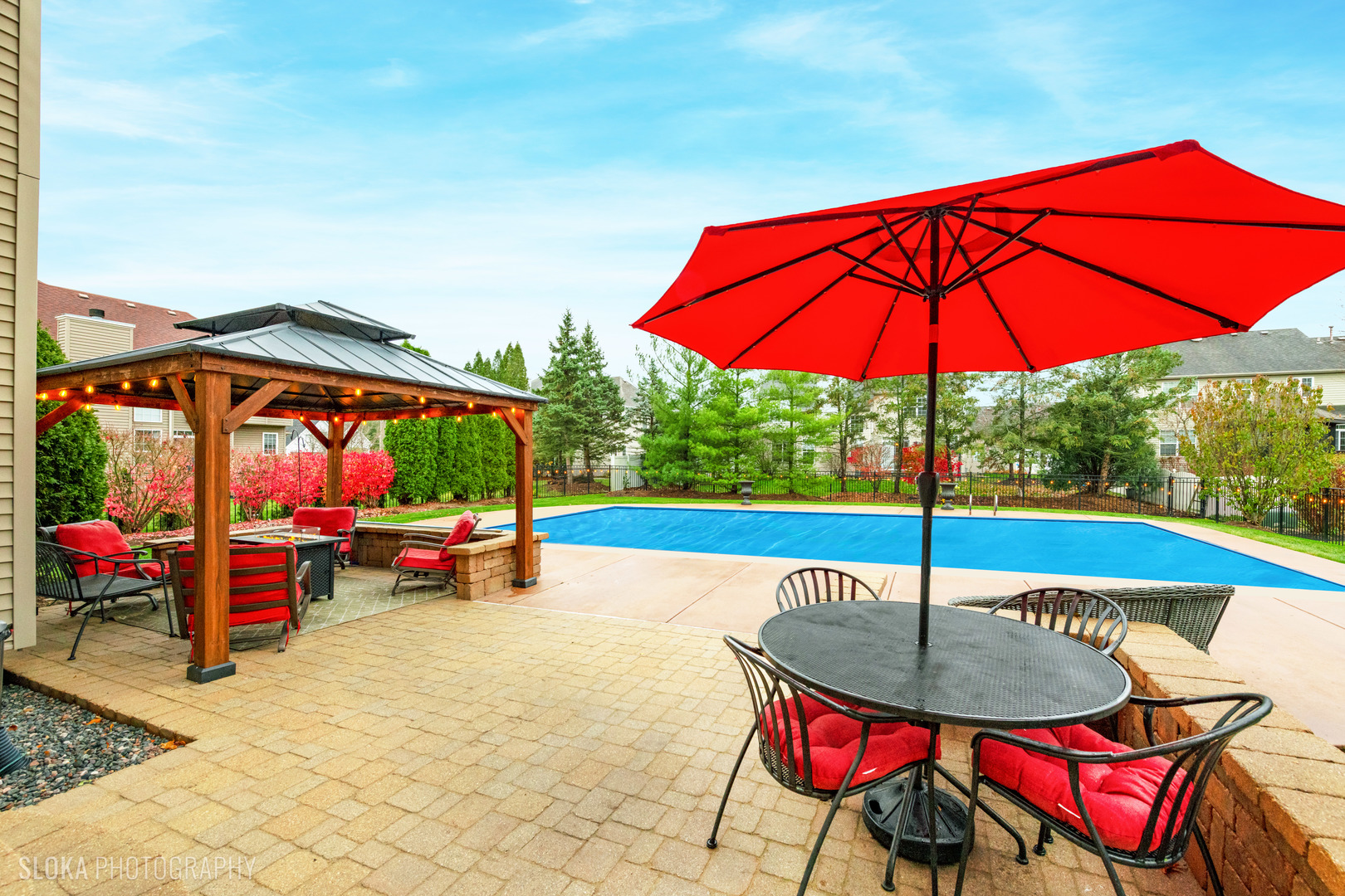 1123 Village Road Crystal Lake, IL 60014 - Photo 35 of 46 a view of backyard with swimming pool and table