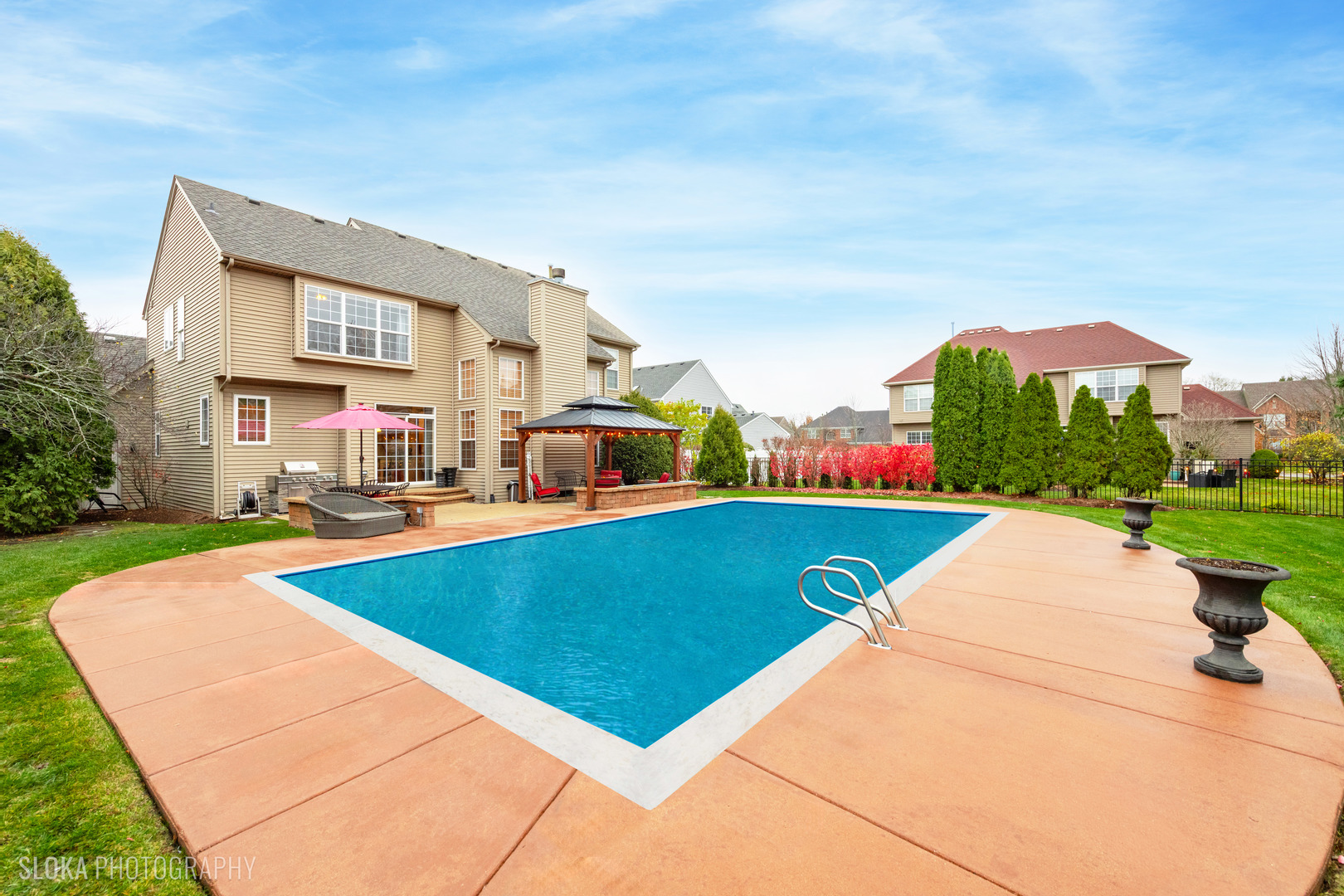 1123 Village Road Crystal Lake, IL 60014 - Photo 37 of 46 a view of swimming pool with outdoor seating and yard in back