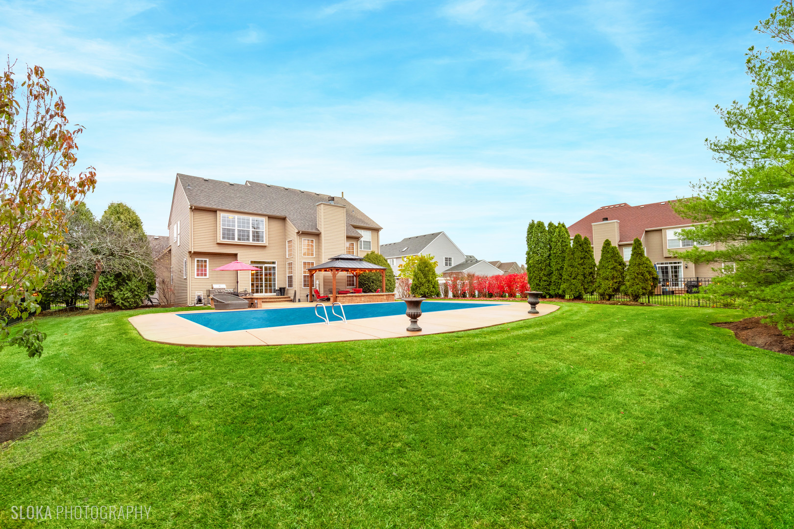 1123 Village Road Crystal Lake, IL 60014 - Photo 39 of 46 a view of a house with swimming pool and a yard