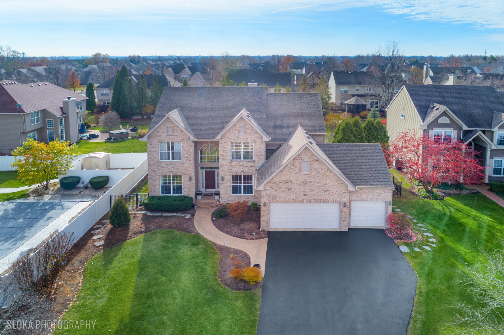 1123 Village Road Crystal Lake, IL 60014 - Photo 41 of 46 an aerial view of a house with a yard