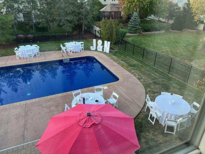 1123 Village Road Crystal Lake, IL 60014 - Photo 46 of 46 a view of a balcony with chair table and chairs