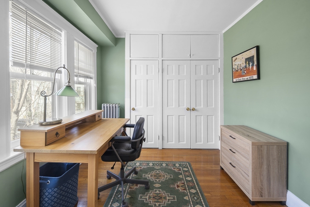 40 Eustis Street Cambridge, MA 02140 - Photo 12 of 23 a room with furniture and a window