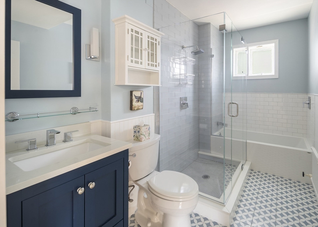 40 Eustis Street Cambridge, MA 02140 - Photo 16 of 23 a bathroom with a sink a toilet and shower