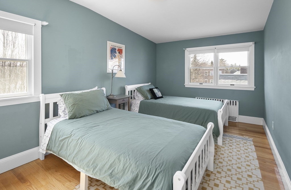 40 Eustis Street Cambridge, MA 02140 - Photo 10 of 23 a bedroom with double bed and a window