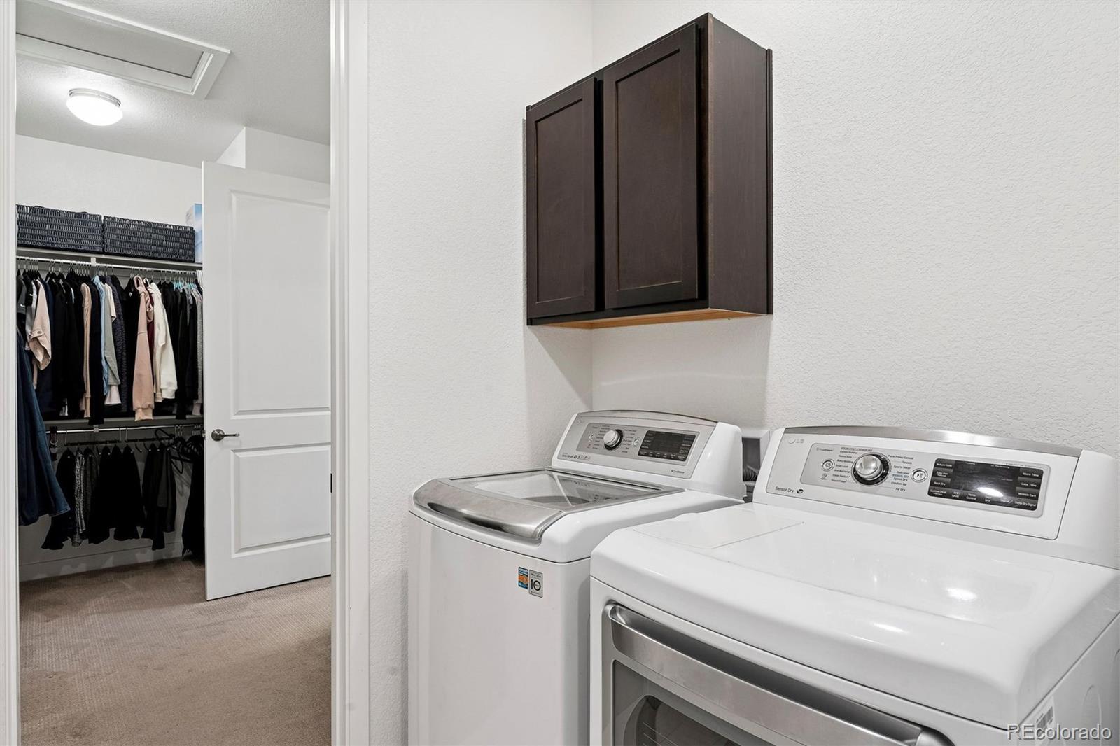 8500 South Riviera Court Aurora, CO 80016 - Photo 23 of 35 a utility room with dryer and washer