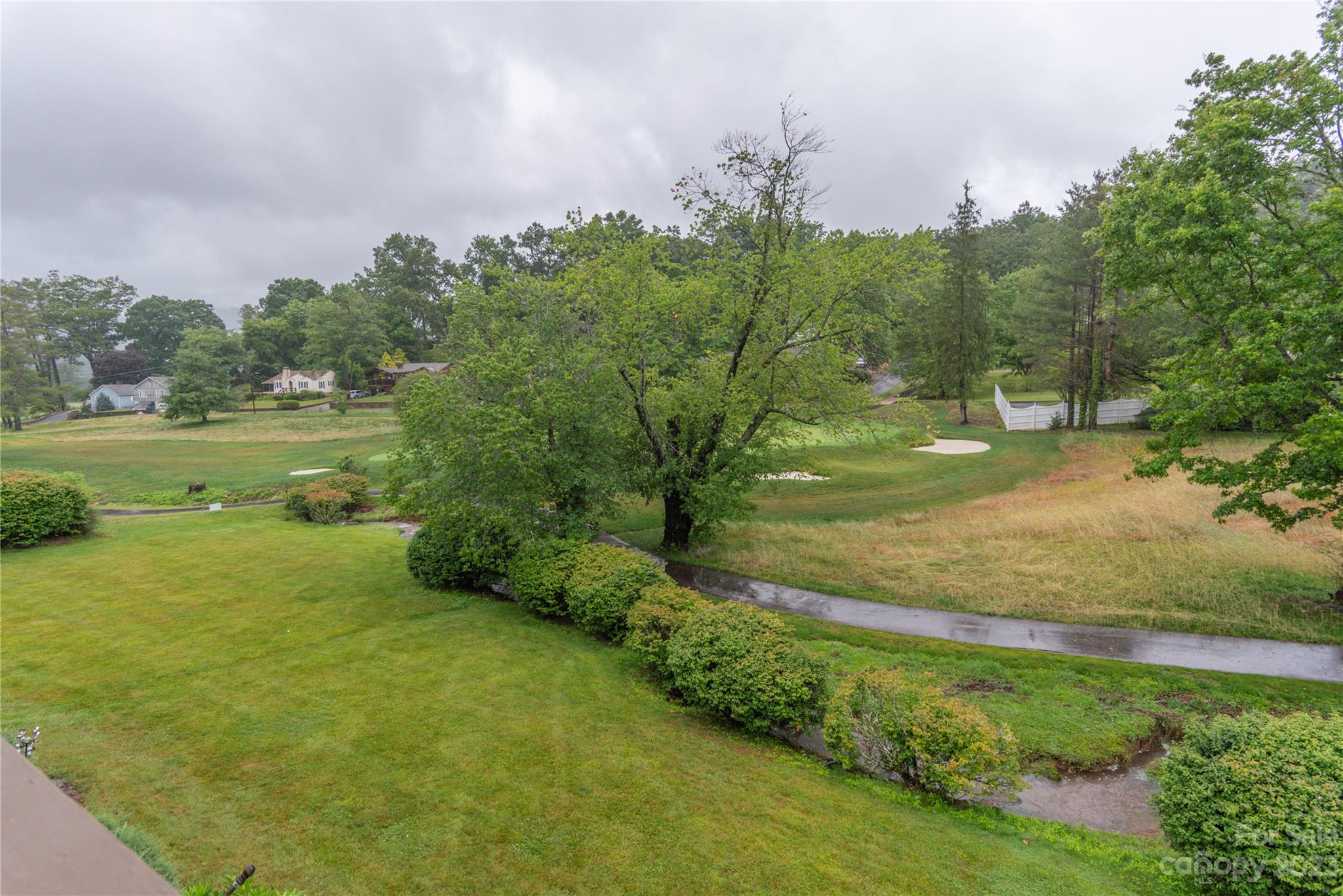 87 Willow Road, Unit D12 Waynesville, NC 28786 - Photo 4 of 21 a view of an outdoor space and a yard