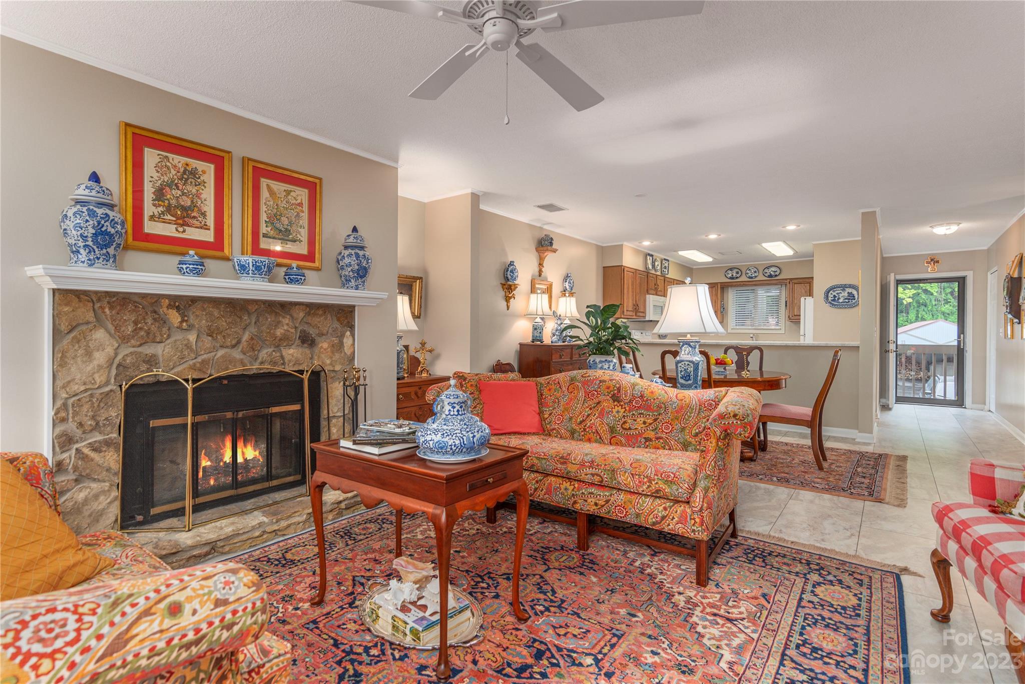87 Willow Road, Unit D12 Waynesville, NC 28786 - Photo 6 of 21 a living room with furniture and a fireplace