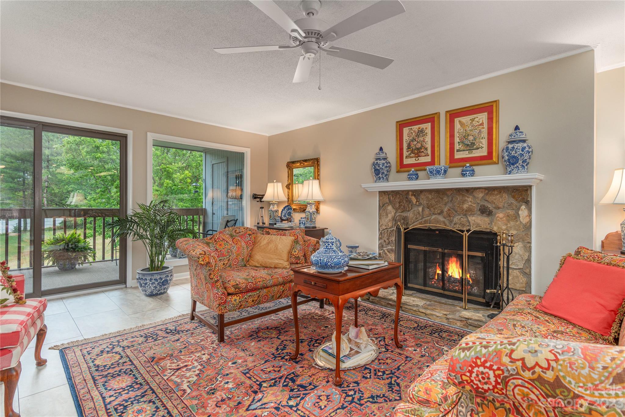 87 Willow Road, Unit D12 Waynesville, NC 28786 - Photo 7 of 21 a living room with furniture and a fireplace