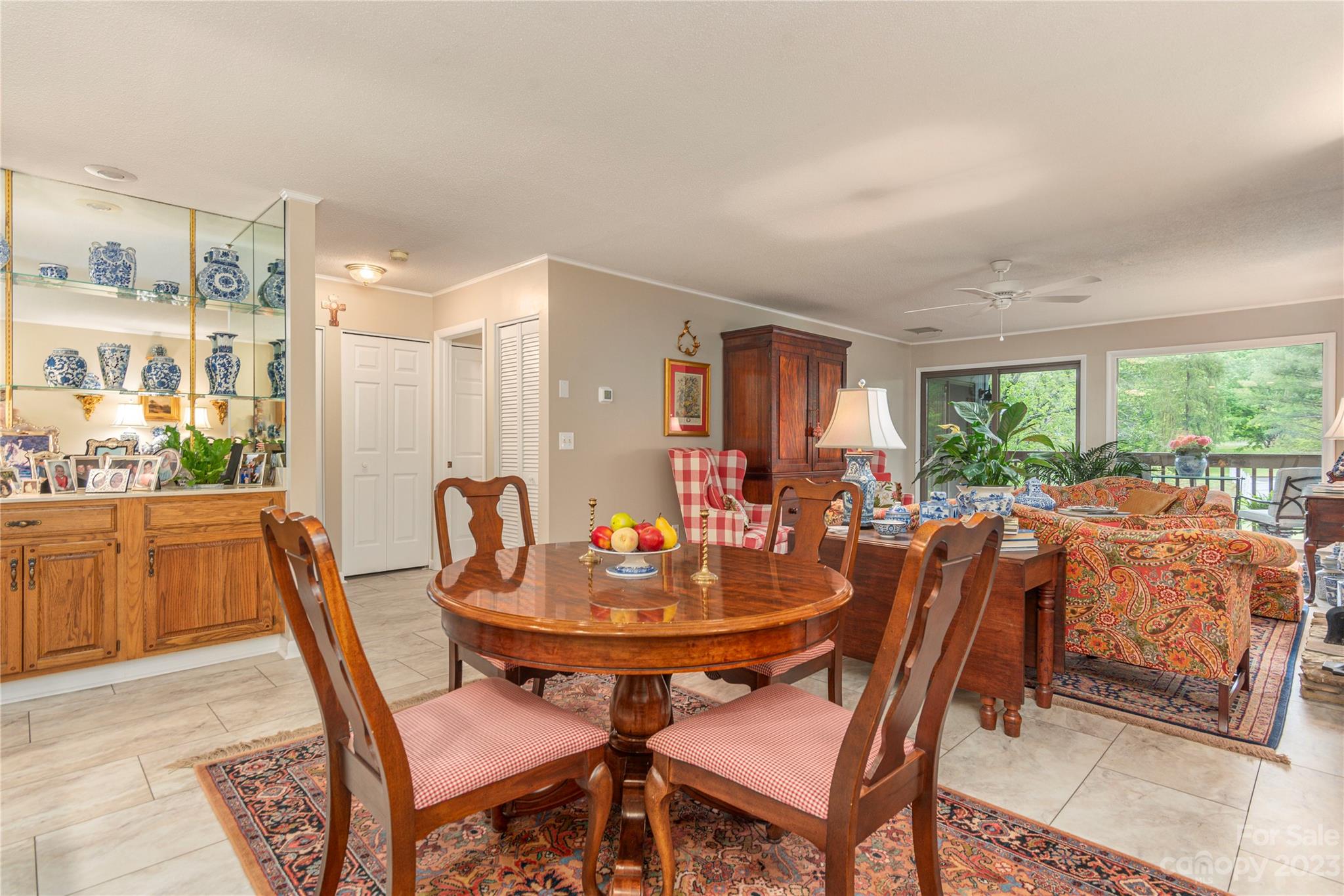 87 Willow Road, Unit D12 Waynesville, NC 28786 - Photo 9 of 21 a view of a dining room with furniture window and outside view
