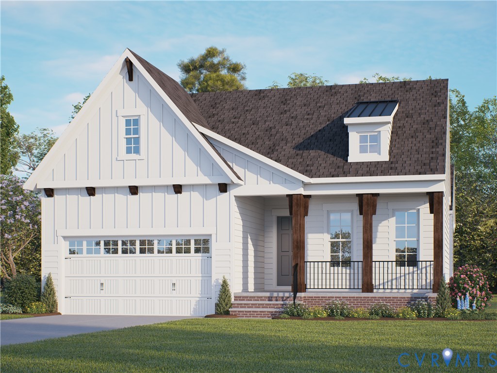 972 Landon Laurel Lane Midlothian, VA 23114 - Photo 2 of 49 a front view of a house with a yard