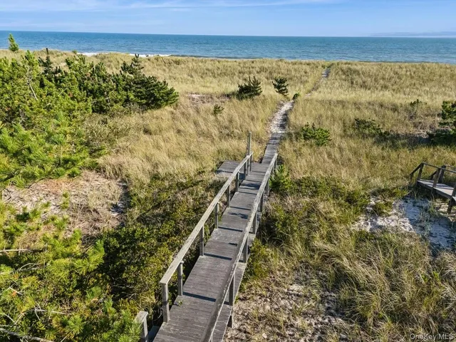 a view of a ocean with beach