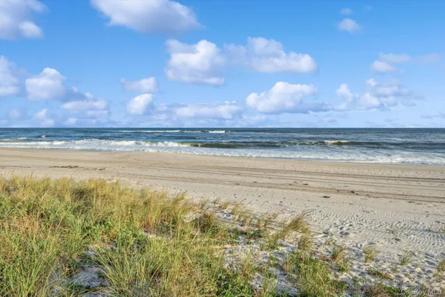 an aerial view of house with yard