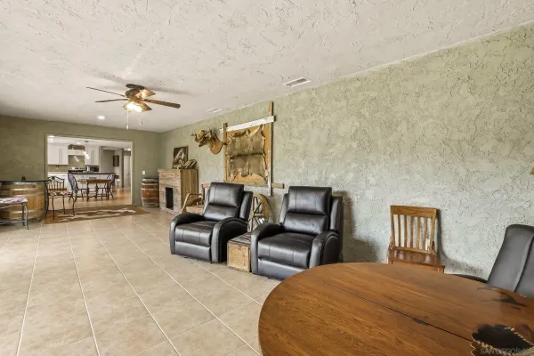 a bedroom with furniture and a chandelier