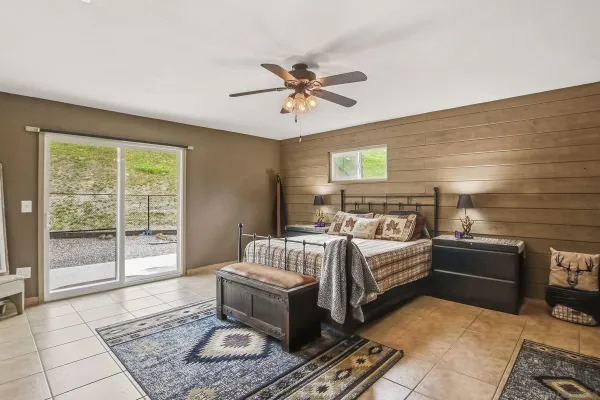 a bed room with furniture and a window