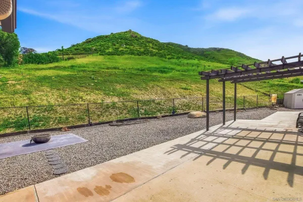 a view of a house with a patio