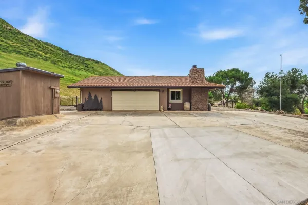 a view of a yard with an outdoor space