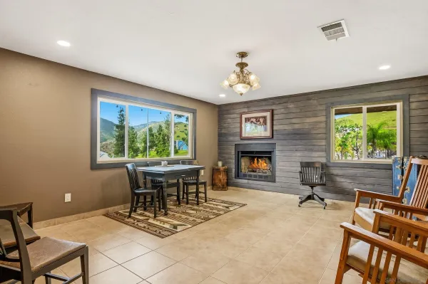 a view of a dining room with furniture window and outside view