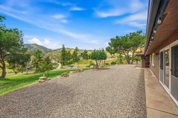 a view of outdoor space yard and mountain view