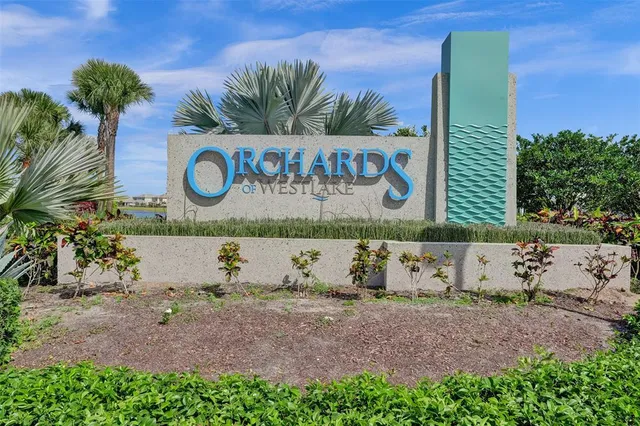 a view of outdoor space with garden and trees