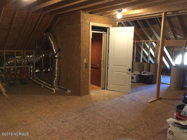 675 Shadetree Road Benson, NC 27504 - Photo 22 of 29 ELEVATOR TO ATTIC STORAGE
