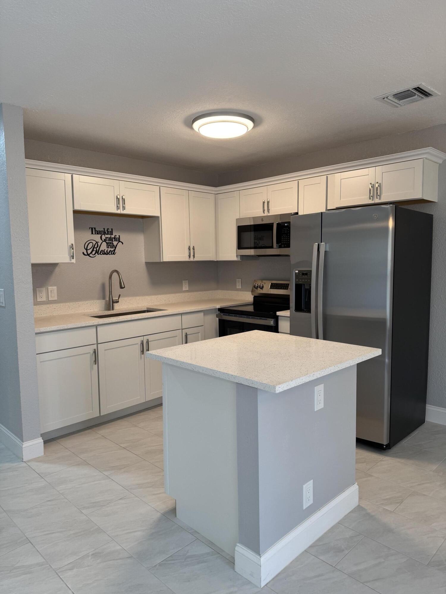 1321 West 3rd Street Riviera Beach, FL 33404 - Photo 6 of 12 Kitchen