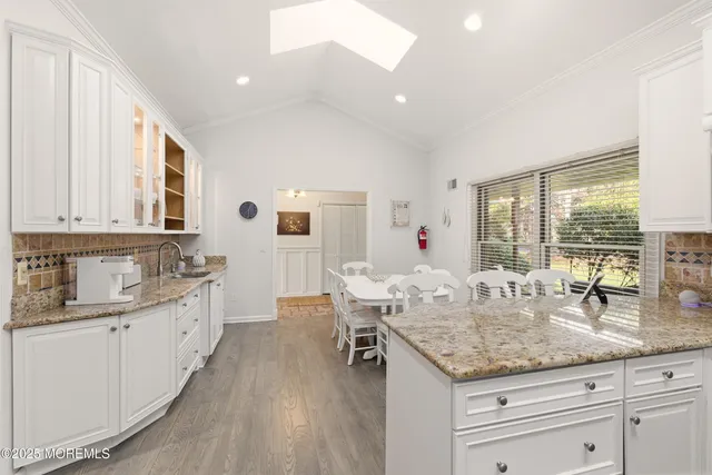 a view of a livingroom with furniture and a fireplace
