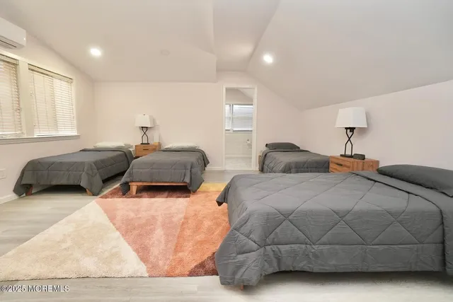 a bathroom with a toilet sink and a mirror