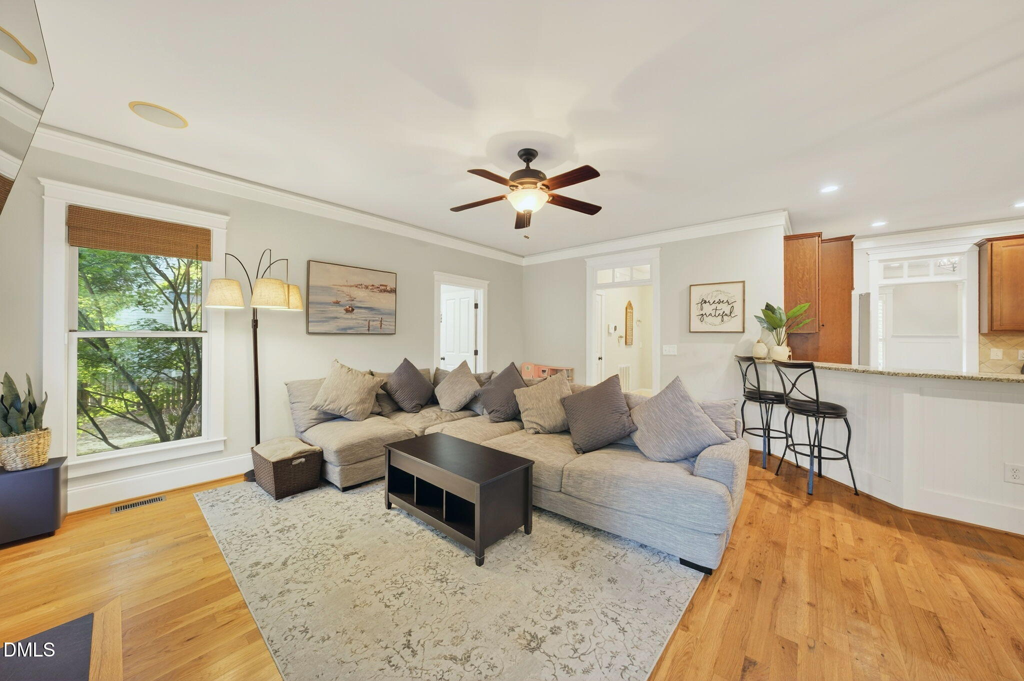 4305 Windscape Drive Apex, NC 27539 - Photo 17 of 50 a living room with furniture and a large window
