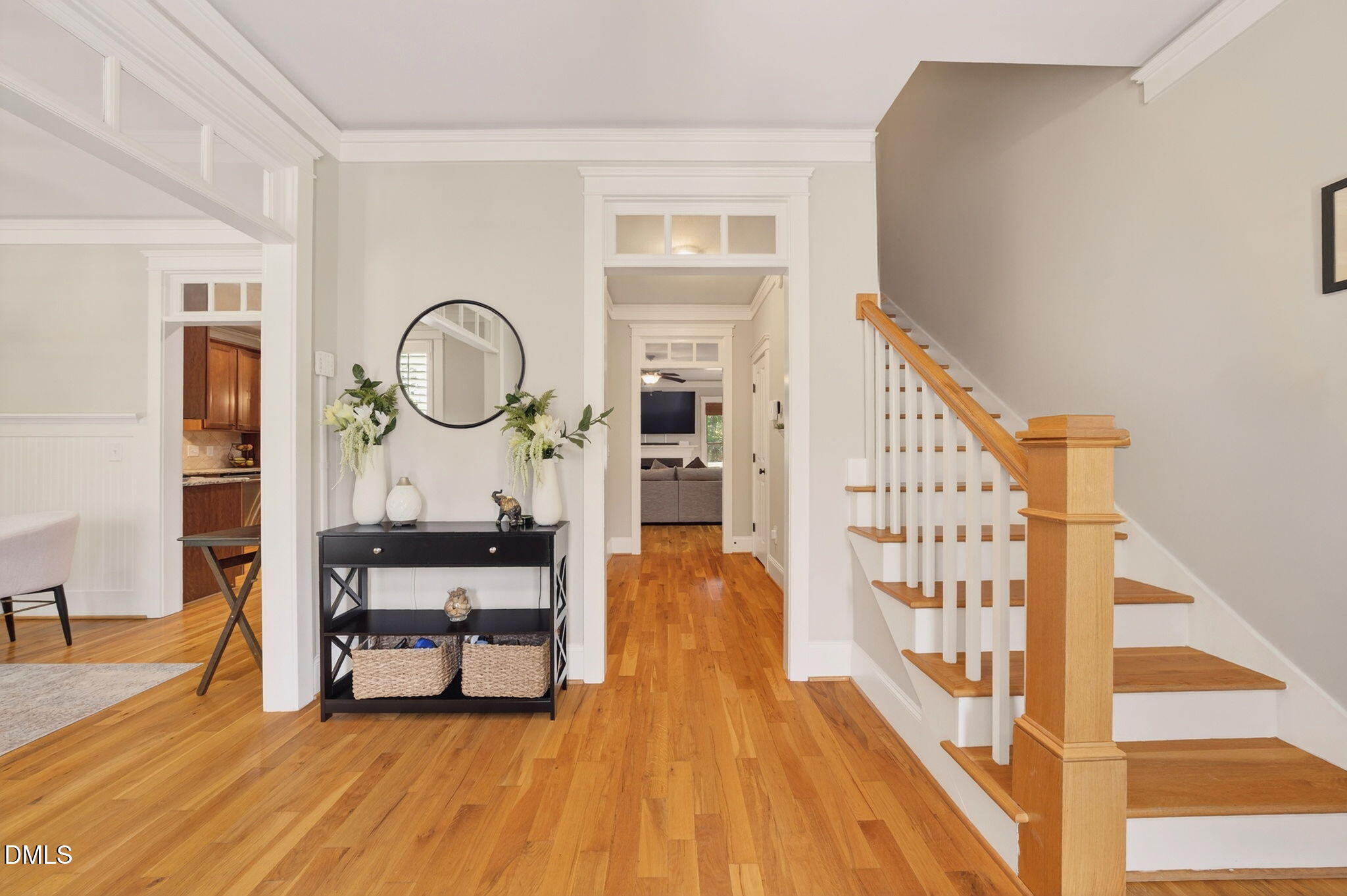 4305 Windscape Drive Apex, NC 27539 - Photo 2 of 50 a view of staircase with wooden floor and a rug