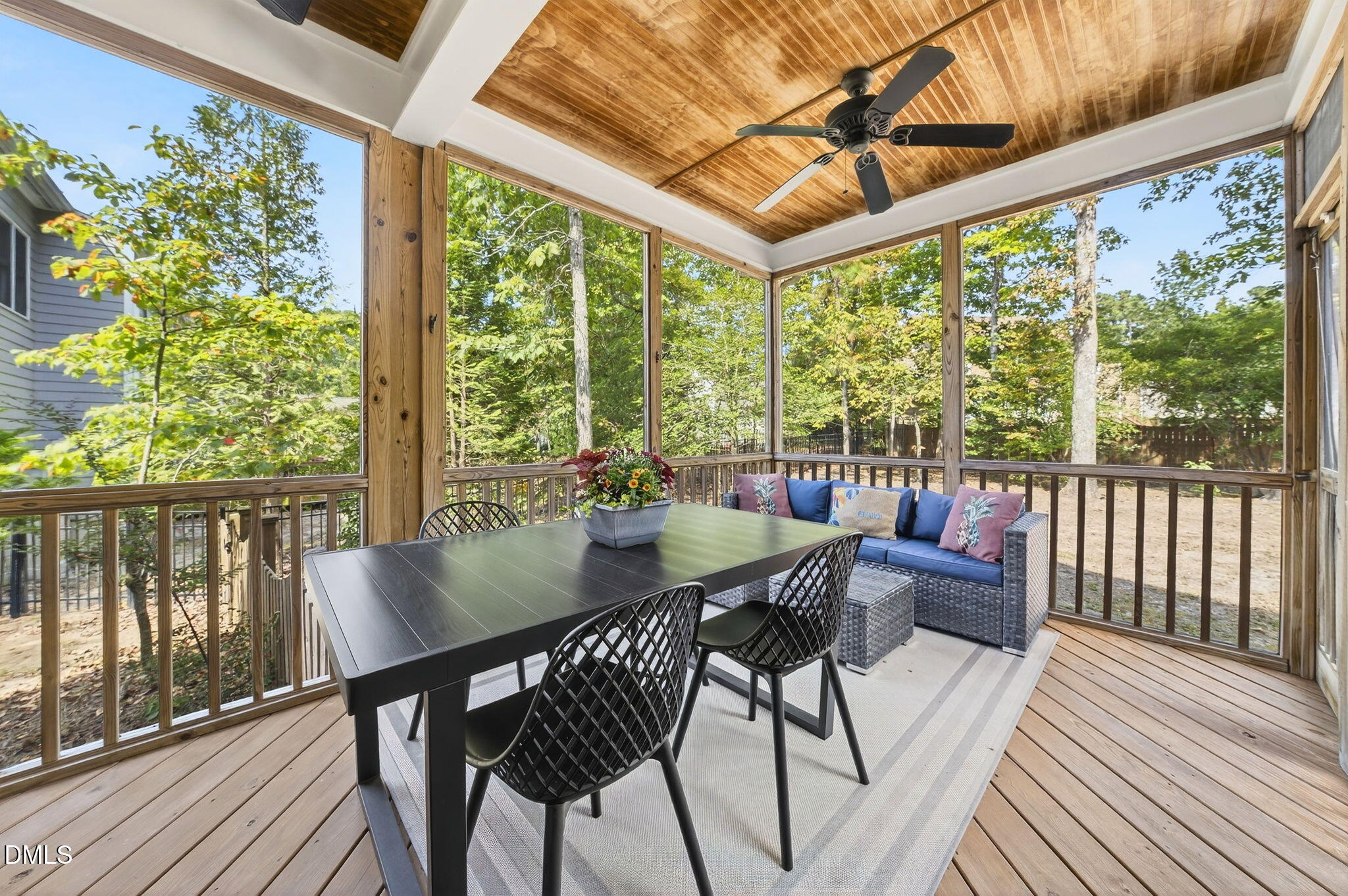4305 Windscape Drive Apex, NC 27539 - Photo 37 of 50 a view of a dining room with furniture window and outside view