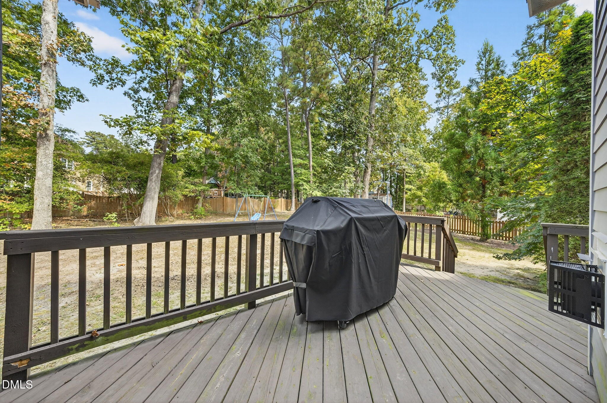 4305 Windscape Drive Apex, NC 27539 - Photo 38 of 50 a balcony with wooden floor and outdoor seating