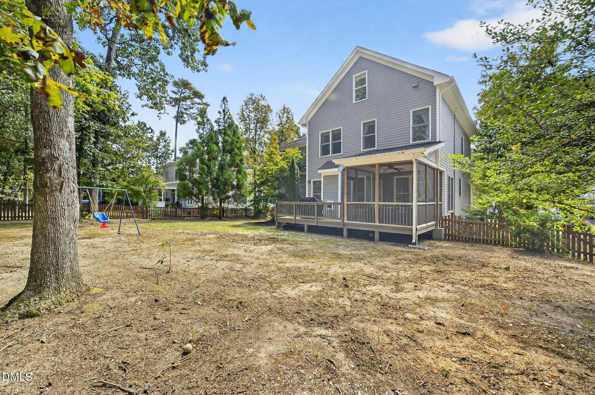 4305 Windscape Drive Apex, NC 27539 - Photo 41 of 50 a house with trees in front of it