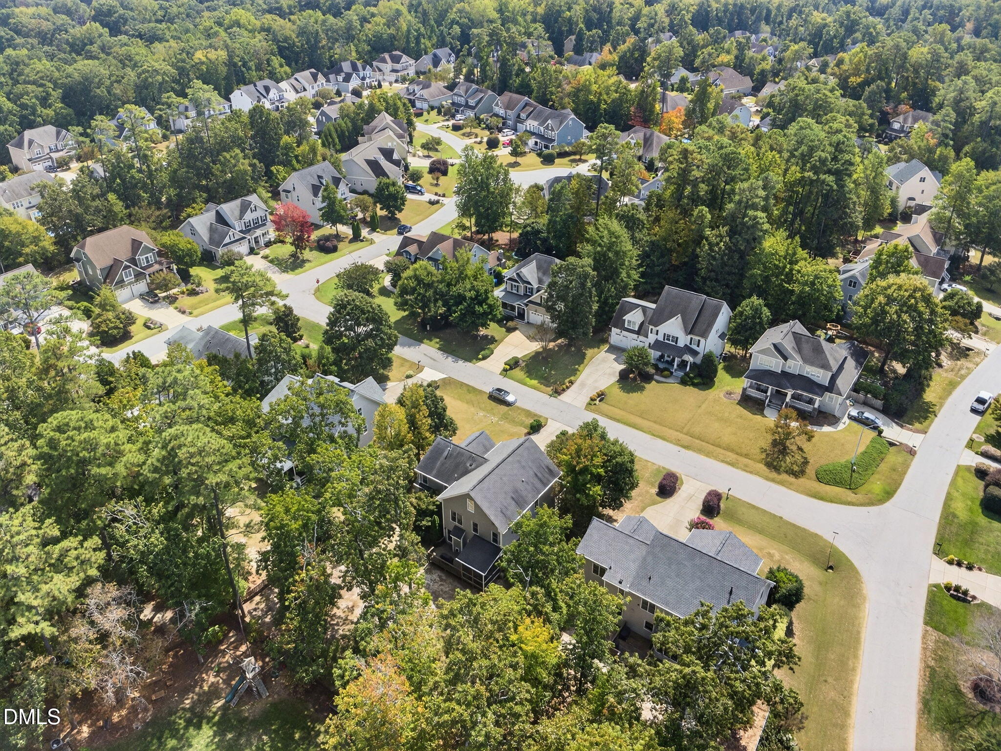4305 Windscape Drive Apex, NC 27539 - Photo 45 of 50 an aerial view of residential house with outdoor space and trees all around