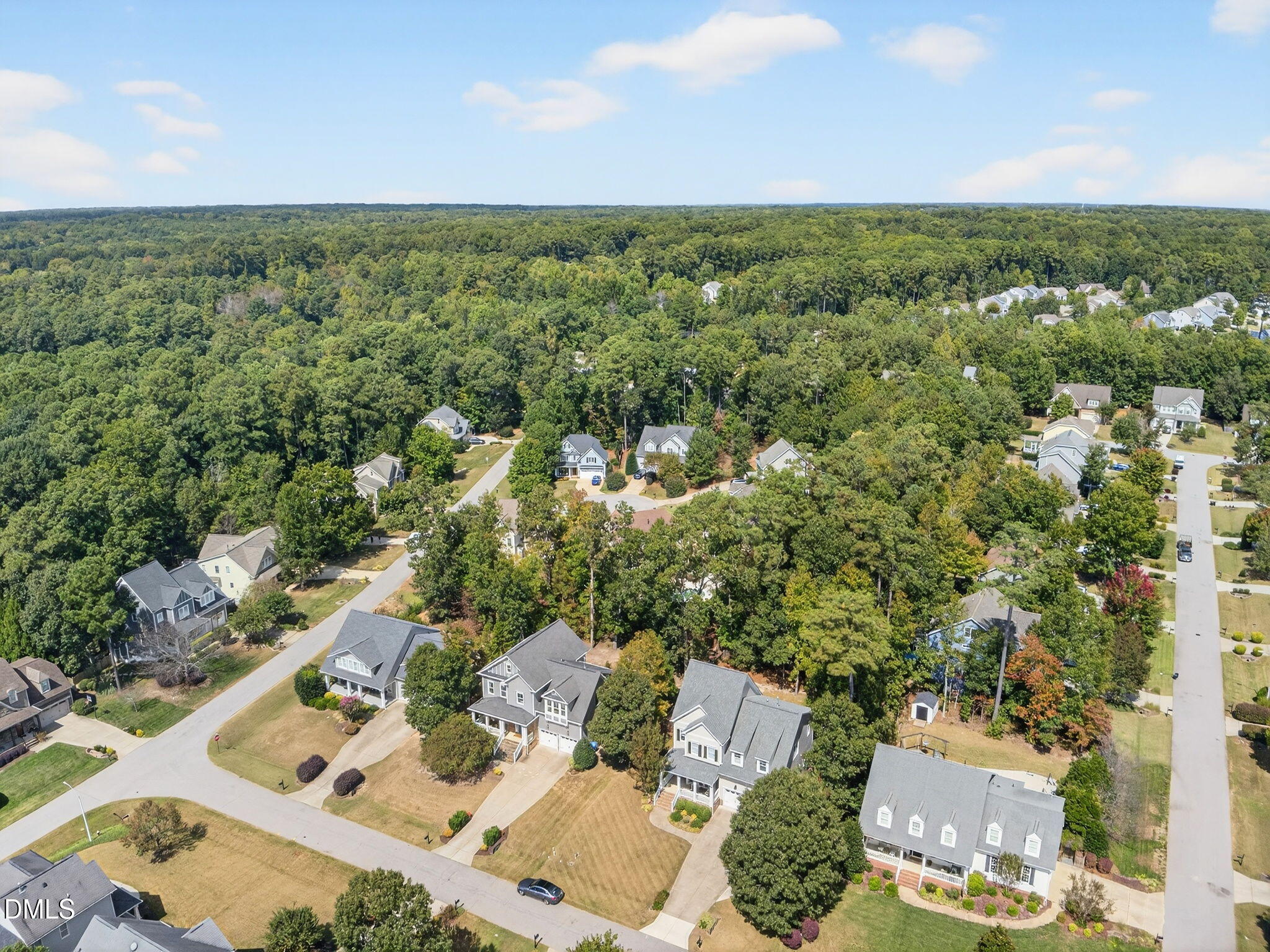 4305 Windscape Drive Apex, NC 27539 - Photo 46 of 50 an aerial view of a house with yard