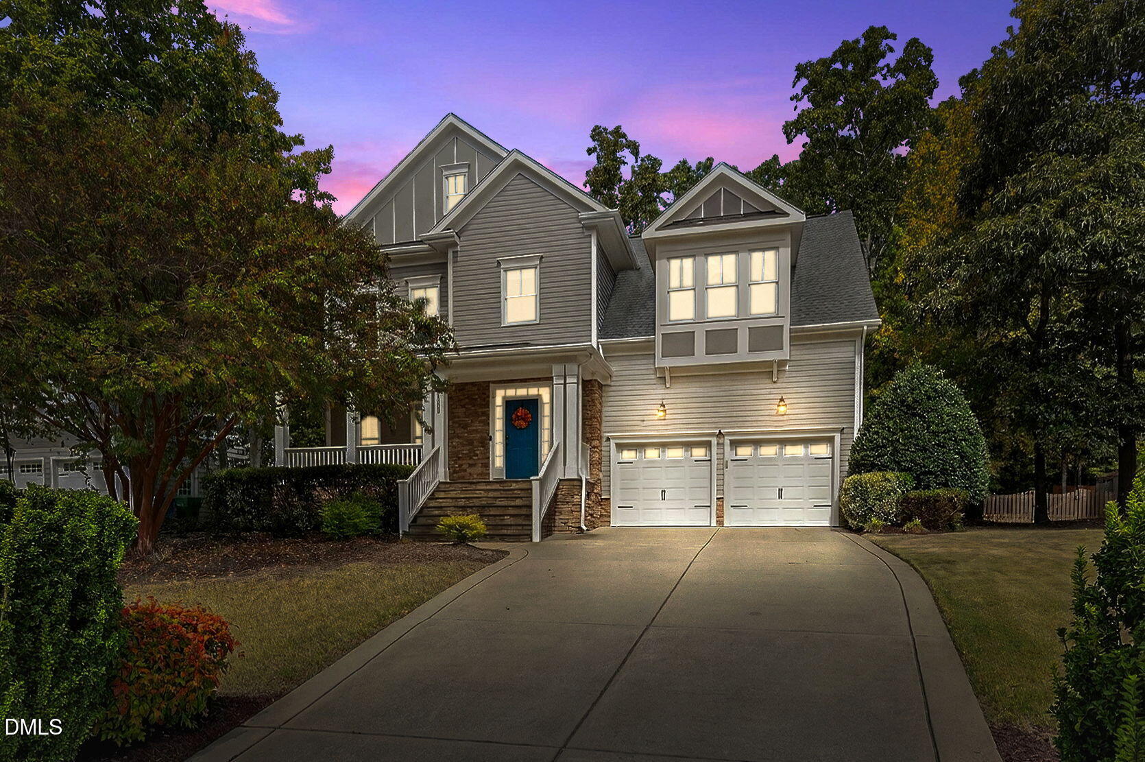 4305 Windscape Drive Apex, NC 27539 - Photo 5 of 50 a front view of a house with a yard and garage