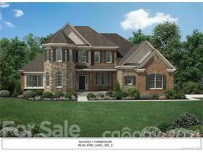 4050 Flowering Peach Road Marvin, NC 28173 - Photo 1 of 1 a front view of a house with a yard