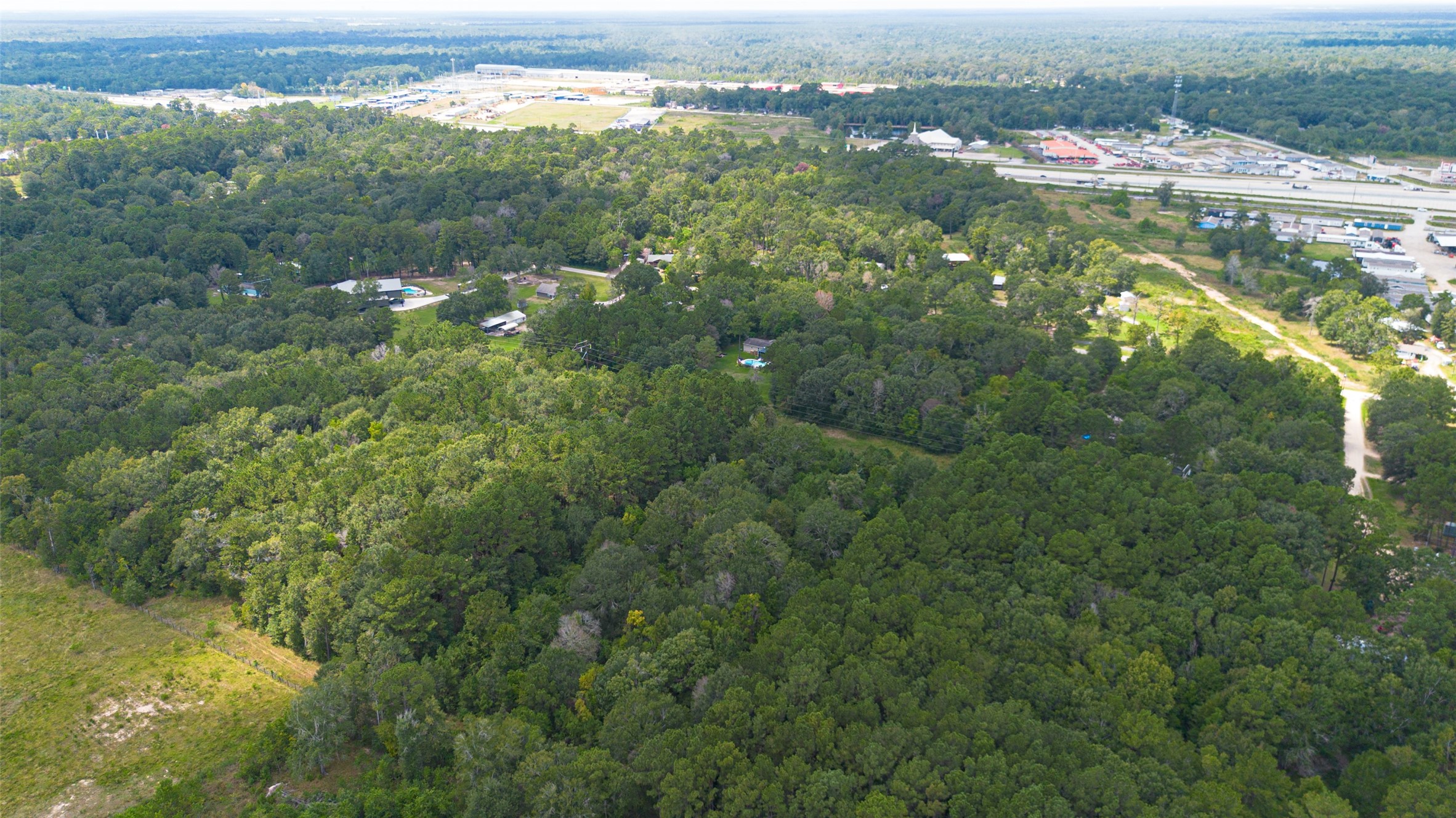12297 Rebel Road Cleveland, TX 77327 - Photo 35 of 36 a view of a city
