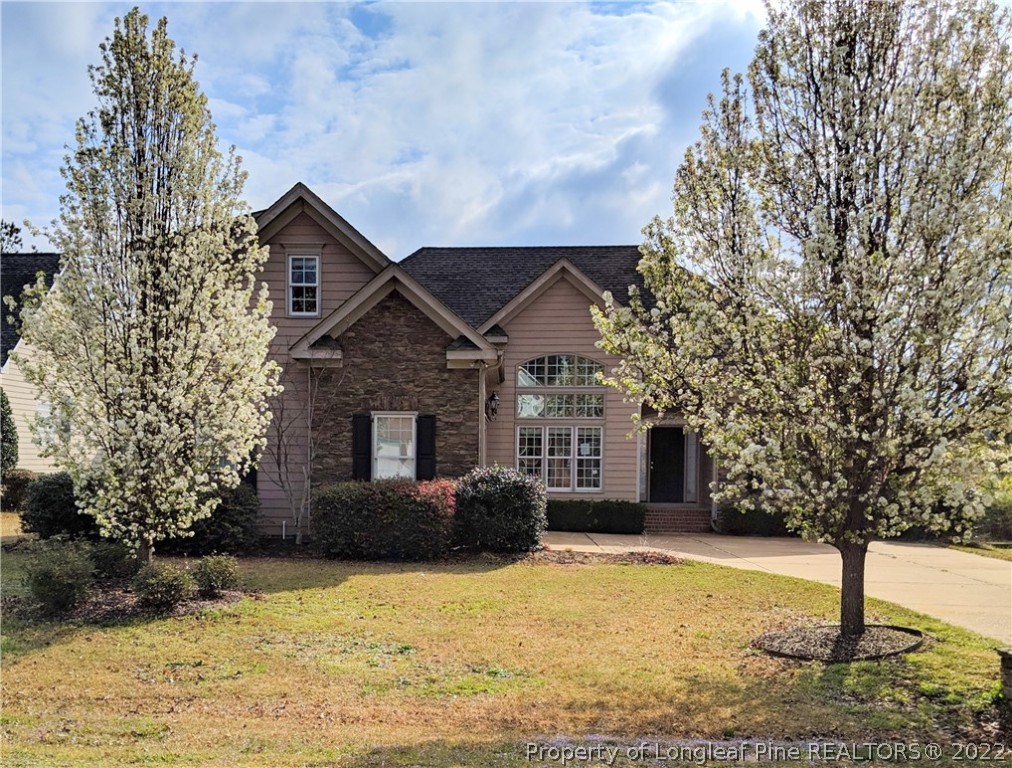 238 Falling Water Road Spring Lake, NC 28390 - Photo 1 of 7 a front view of a house with a yard