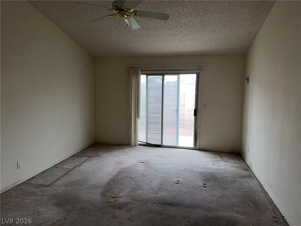 277 Gentle Bay Avenue Henderson, NV 89074 - Photo 39 of 43 This versatile space features direct outdoor access, offering endless possibilities for personalization.