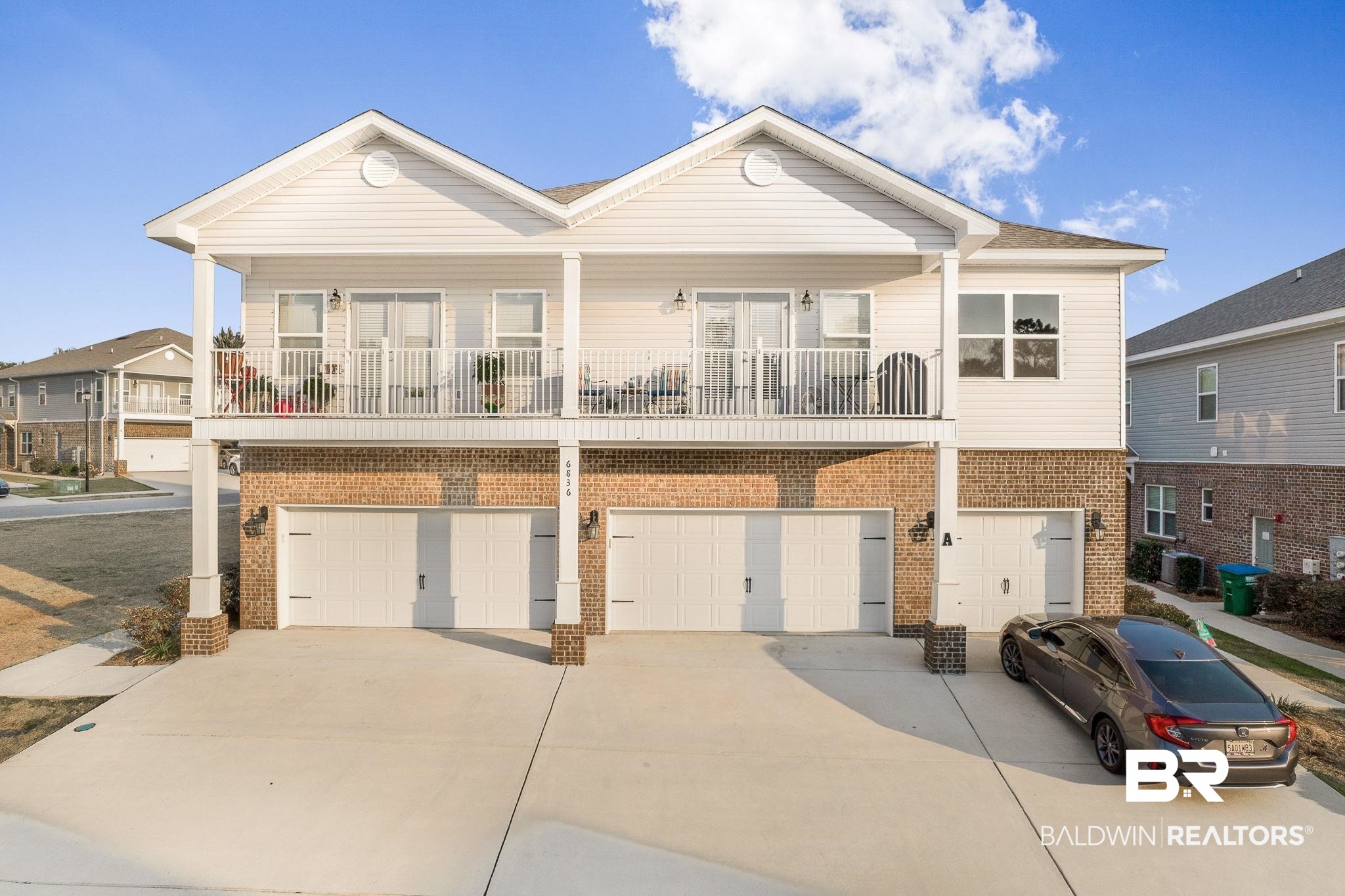 6836 Spaniel Drive, Unit B Daphne, AL 36527 - Photo 3 of 28 Middle Garage